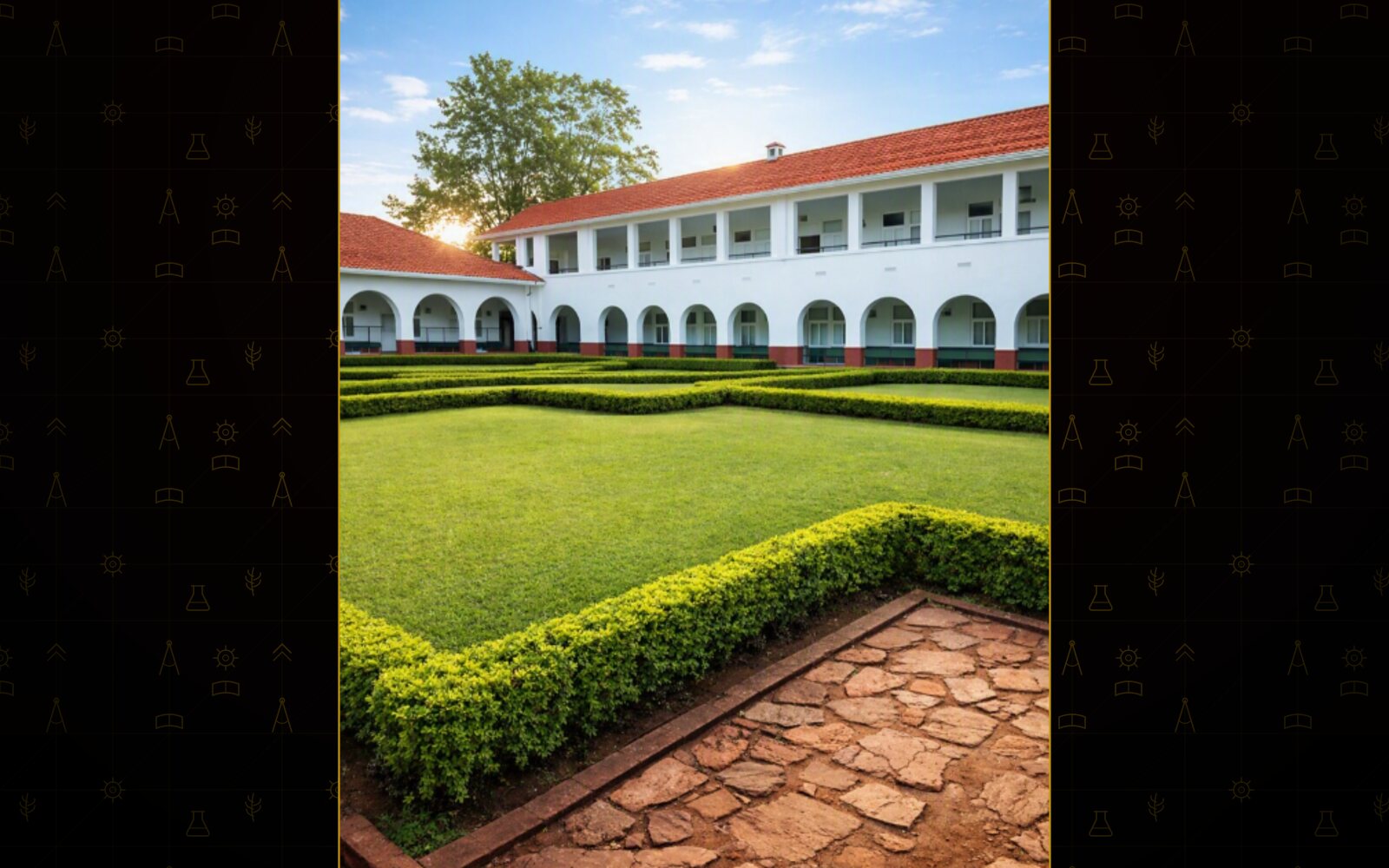 Arched walkways enclosing the box-hedged lawn.